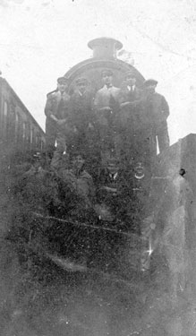 Apprentices with a steam locomotive at the LNER Engine Yard, Darnall
