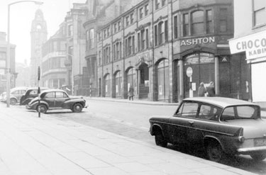 Norfolk Street looking towards the Victoria Hall, showing (r. to l.) No.18 Thorntons Chocolate Kabin; junction with Change Alley; Thomas A. Ashton Ltd., engineers; No.36 The Sheffield Club and Pawson and Brailsford Ltd., printers