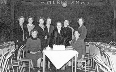 R.A.F. Norton Wives Club, Christmas Party (l. to r.) seated Sally Mummery and Mrs. Dodds; standing Mrs. Singer (extreme left); Elsie Stubley (centre) and Joan Williams