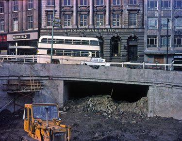 Castle Square showing the Hole in the Road under construction  with the Midland  Bank and Manfield and Sons Ltd., shoe shop, High Street in the background, c. 1967