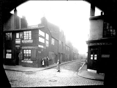 Ward Street from Bowling Green Street. No 5, Bowling Green Street, Miss Susannah Ellis, Shopkeeper (left). No 7, Joseph Henry Booth's Beerhouse, (right), probably called known as Brunswick public house, hence the sign