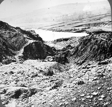 View of the break from outside Dale Dyke Reservoir shortly after the flood of 1864