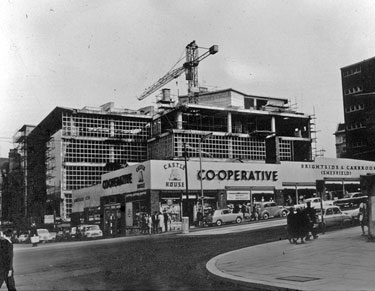 Construction of Castle House (No. 2), Brightside and Carbrook Co-operative Society, Angel Street from the junction of Bank Street, c. 1962