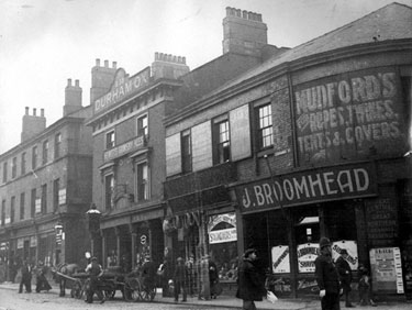 Exchange Street from Furnival Road to Exchange Lane (foreground), 1913-1914, No. 57 John C. Broomhead, hairdresser, No. 55 J.H. Mudford and Sons, rope and twine manufacturers, Nos. 51 - 53 Durham Ox public house