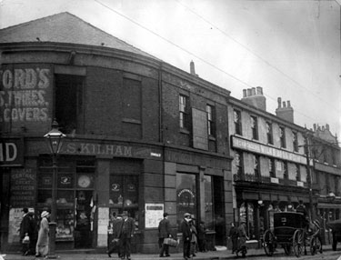 Furnival Road from Exchange Street, No. 1 Furnival Road, Clement Schofield Kilham, tobacconist, Nos. 3 - 5 Michael Law, refreshment rooms, Nos. 7 - 9 Wilks Bros. and Co., ironmongers