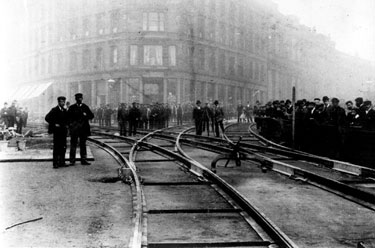 Laying tram tracks on Church Street and Fargate showing Cole Brothers, department store, in background