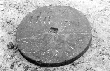 Grinders gravestone in Attercliffe Chapel of Ease Churchyard, Hill Top, Attewrcliffe Common. Inscription reads, H.R., 1716-1789, diameter 20 inch