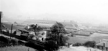 Elevated view of Nos. 434 and 432 Grimesthorpe Road (left foreground), looking towards the Munition Huts on Petre Street before their removal and Steel Works beyond