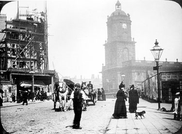 Pinstone Street prior to the construction of the Town Hall. St. Paul's Church, right. Construction of Stewart and Stewart, tailors and Sheffield Cafe Co., left