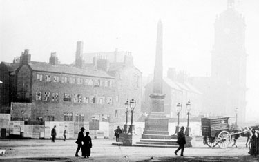 Jubilee Monolith, Town Hall Square, from Leopold Street, prior to construction of Town Hall. Pinstone Street, Cheney Square and St. Paul's Church, right, Surrey Street, left (out of view), showing rear of premises fronting New Church Street