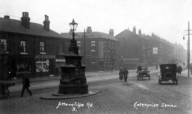 Drinking fountain at the junction of Attercliffe Road and Effingham Road with Nos. 469 - 471 Old Green Dragon public house (also called the Green Dragon) and Baldwin Street in the background