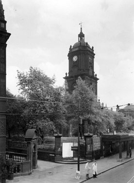 St. Paul's Church from Pinstone Street showing the gateway to the Public Lavatories, Cheney Row and entrance to St. Paul's Graveyard 	