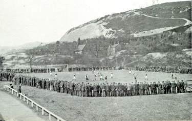 A typical match in Sheffield where players and spectators are unemployed men 1930's
