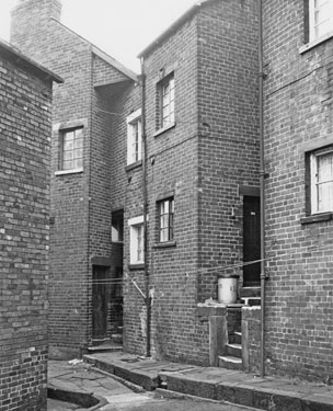 Three back doors in one small area, Nos. 3 Thorndon Road 120 (steps leading to) and 122; 124 and 126, Sutherland Road with the yard entrance extreme left