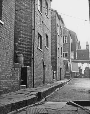 Rear of Nos. 124 (extreme left) 126;128; 130; 132 and 134, Sutherland Road showing drainage channel in the back yards 