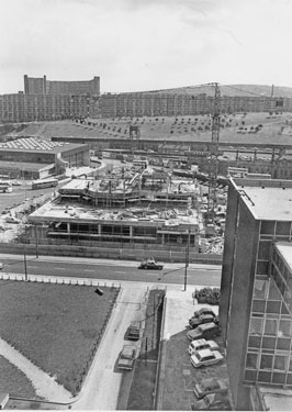 Sheffield Polytechnic Library, Pond Street under construction with Sheaf Valley Baths left and Park Hill Flats in the background
