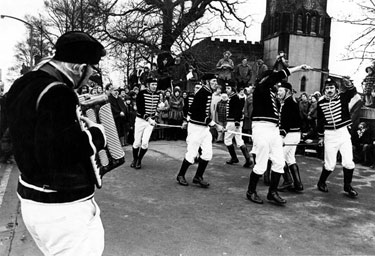 Handsworth Traditional Sword Dancers at St. Marys C.of E. Church, Handsworth Road in the background