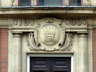 Datestone and trademark on the entrance of the former cutlery works of Harrison Brothers and Howson on Carver Street. 