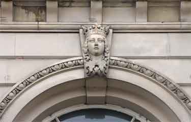 Decorative head above a window on the former Sheffield Trustees Savings Bank at that time occupied by the Old Monk public house, Nos. 103 - 107 on Norfolk Street
