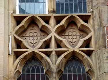 Carved details on The Sanctuary public house, No. 4 St James' Street, former Church of England Educational Institute and later public houses such as Gladstones and the Ferret and Trouser Leg.