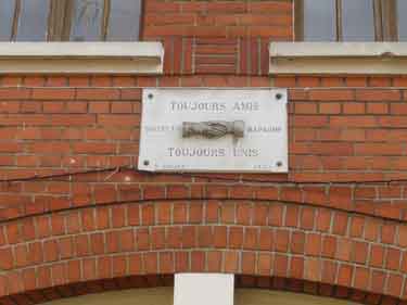 Toujours Amis, Toujours Reunis (Always Friends, Always Reunited) plaque on front of the Ecole Lawrence, Bapaume