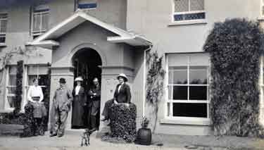 Arthur Wightman (1842 - 1924) with friends outside unidentified house