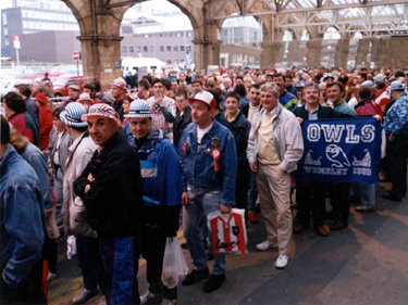 Sheffield United and Sheffield Wednesday supporters at Sheffield Midland railway station on their way to the F.A. Cup Semi Final at Wembley 