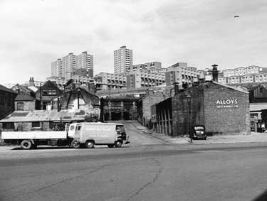 Woodside and Pye Bank Flats and maisonettes, Pitsmoor showing (right) Alloys (West Riding) Ltd., non ferrous metal manufacturers, No. 114 Harvest Lane