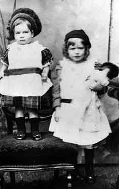 Reg Glenn (later served in the Sheffield City Battalion in World War One) with his sister (aged one)