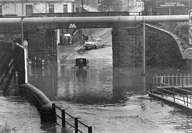 Flooding under a bridge at Fife Street, Wincobank (Engineers Hotel on right)