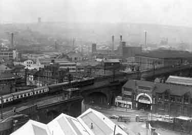 Elevated view of electric train on the Wicker Arches showing Bentley Brothers, motor dealers and Northern Kitchen Equipment Company Ltd