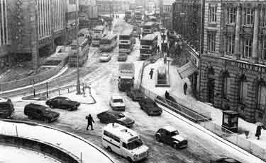 Snow on Angel Street and High Street showing Midland Bank (right) and Rackhams Department store (left)
