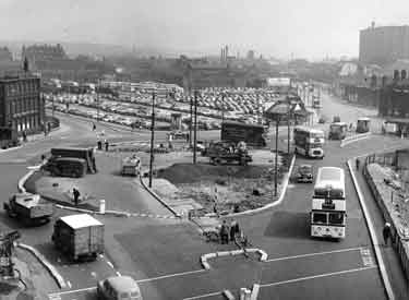 Construction of Sheaf Square roundabout at the junction of Leadmill Road and Paternoster Row, looking towards Sheaf Street and Sheffield Midland railway station and Park Hill flats (right) 