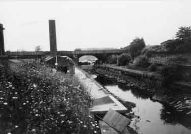 The Sheffield and South Yorkshire Navigation near to Maltravers Street showing a chimney which formerly belonged to the Sheaf Works