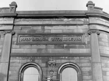 Carved stone inscription on the School of Medicine (latterly the Army Information Office), Surrey Street