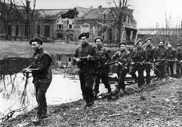 14th King's Own Yorkshire Light Infantry (KOYLI) on patrol in the village of Elst, Holland
