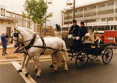 A re-enactment of the opening of the Town Hall showing a horse and carriage containing Queen Vict