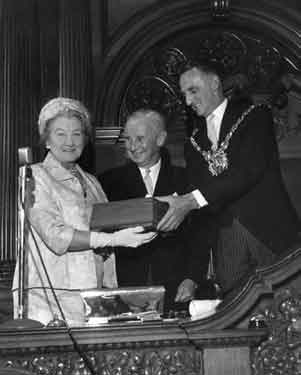 Presentation by the Lord Mayor, Alderman Harold Lambert (right) to the previous Lord Mayor, Alderman Lionel Stephen Edward Farris, JP and Lady Mayoress, Mrs Lily Graham