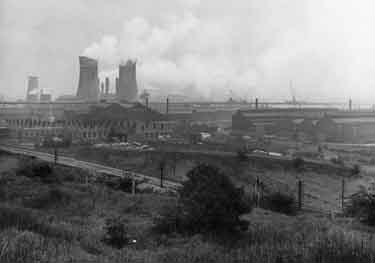 View of the industrial Lower Don Valley showing (back left) Blackburn Meadow power station and (right) construction of the M1 Motorway and Tinsley Viaduct