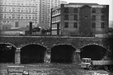 Arches at the Canal Basin showing Straddle Warehouse (centre right) and Hyde Park Flats (left)