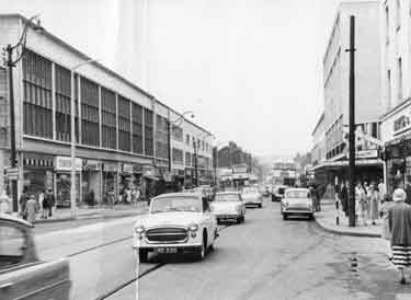 Shops on The Moor showing (right) Marks and Spencer and Nos. 78 - 82 John Atkinson Ltd., department store and (left) No.85 Lesters (Pride) Ltd., gowns, No.87 William Timpson Ltd., shoe shop and No. 89 A. Shapero Ltd., house furnishers