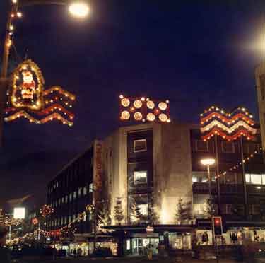 Christmas lights at junction of The Moor and Furnival Gate showing (centre) Debenhams, department store