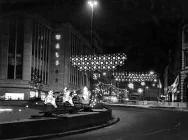 Christmas decorations on Castle Square looking towards High Street showing (top left) J. Walsh and Co., department store