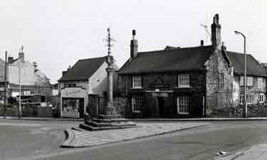 Market Square, Woodhouse showing (left) No. 16 Harrison and Kemshall, butchers, No. 14 Cross Daggers public house and (foreground) Woodhouse Market Cross