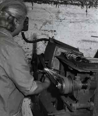 Nora Ogden, grinding the inside of the eyes, Frank Turton Ltd., scissor manufacturer, No. 72 Arundel Street
