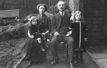 Family group, back of 76 Hunter Road, Hillsborough, c. 1914