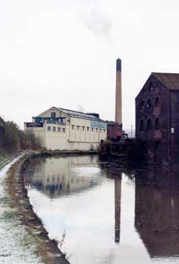 Sheffield and South Yorkshire Canal looking towards (centre) A. Marriott, haulage contractors, No.1 Lumley Street and Bernard Road incinerator chimney
