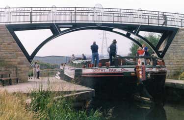 The 'Dorothy Pax' canal keel on the Sheffield and South Yorkshire Navigation going under the Brown Bayley Bridge