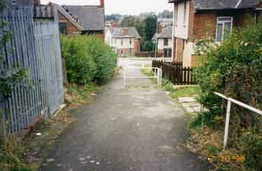 Demolition of Flower Estate showing footpath between Daffodil Road and Clematis Road