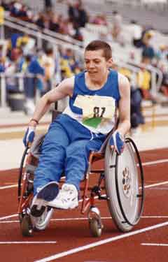 Special Olympics, wheel chair athlete at the opening ceremony, Don Valley Stadium, Worksop Road